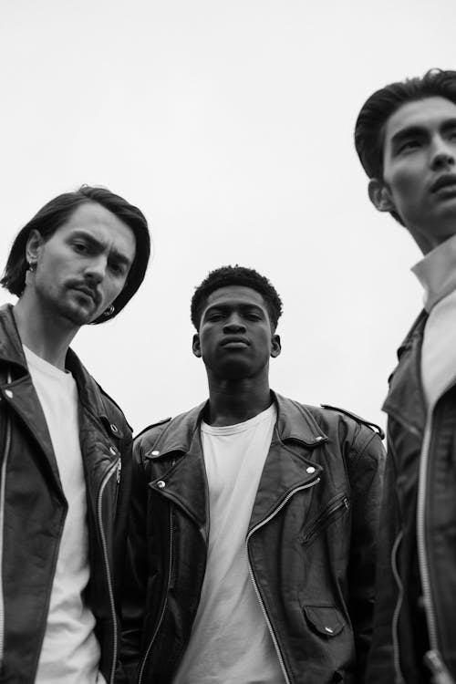 Group of Men Wearing Black Leather Jacket