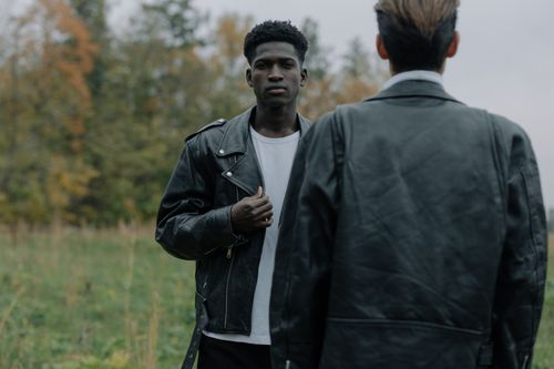 Free Stylish men in leather jackets outdoors, perfect for fashion and lifestyle themes. Stock Photo
