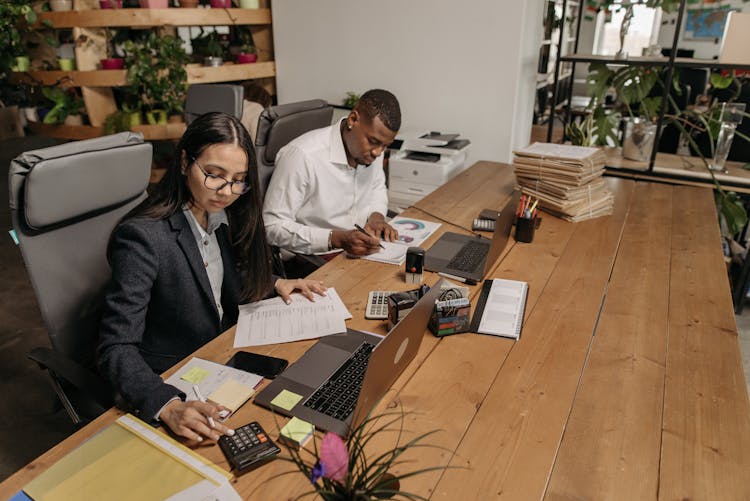 Man And Woman Working In The Office