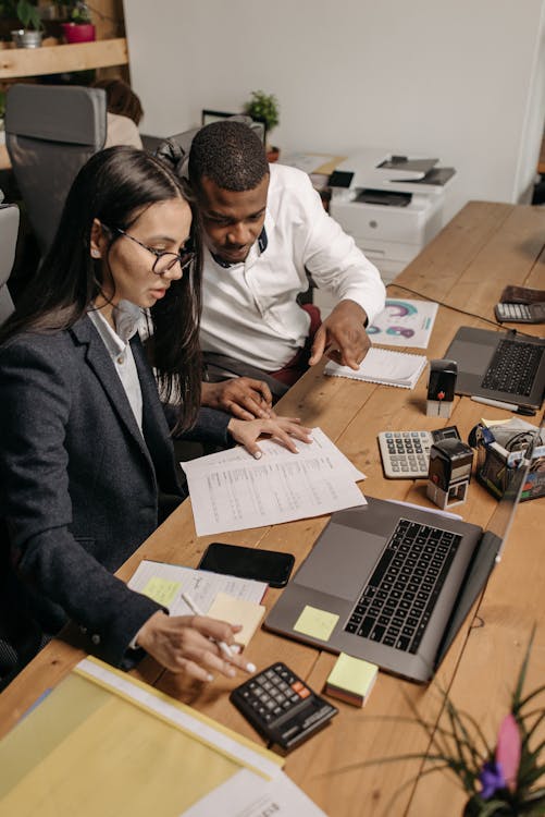 Free People Working at the Office Together Stock Photo