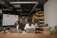 Three People Working in the Office