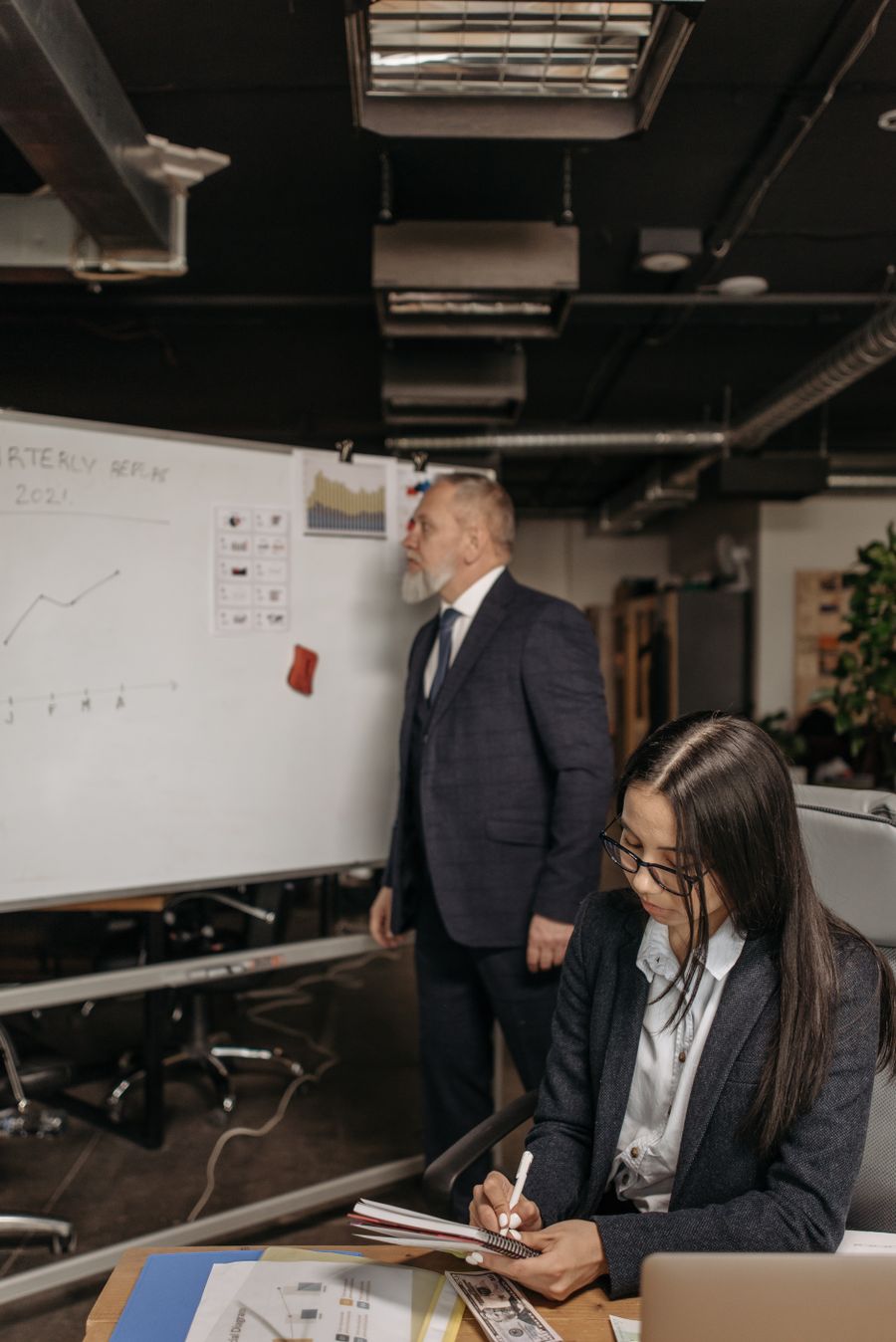 Business professional reviewing corporate documents