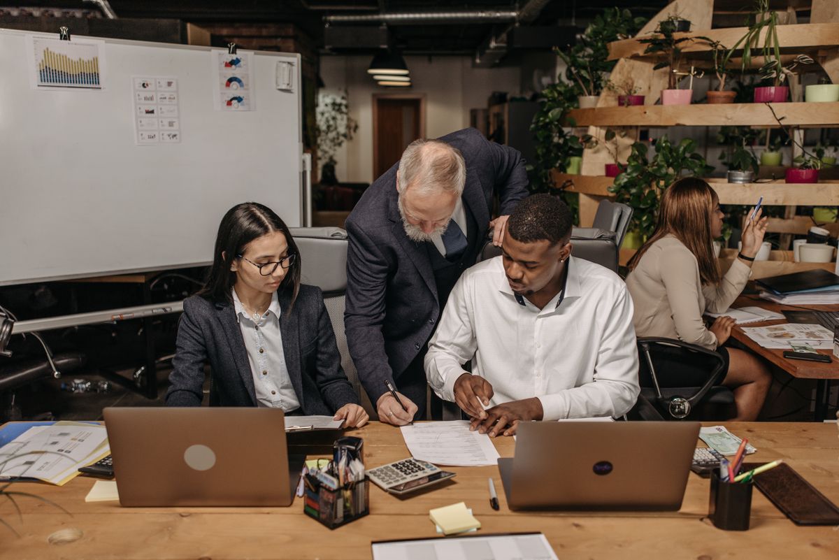 Business leaders reviewing productivity opportunities during an online AI business audit
