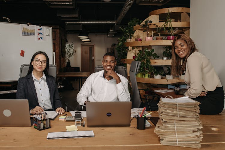 Happy Coworkers At An Office