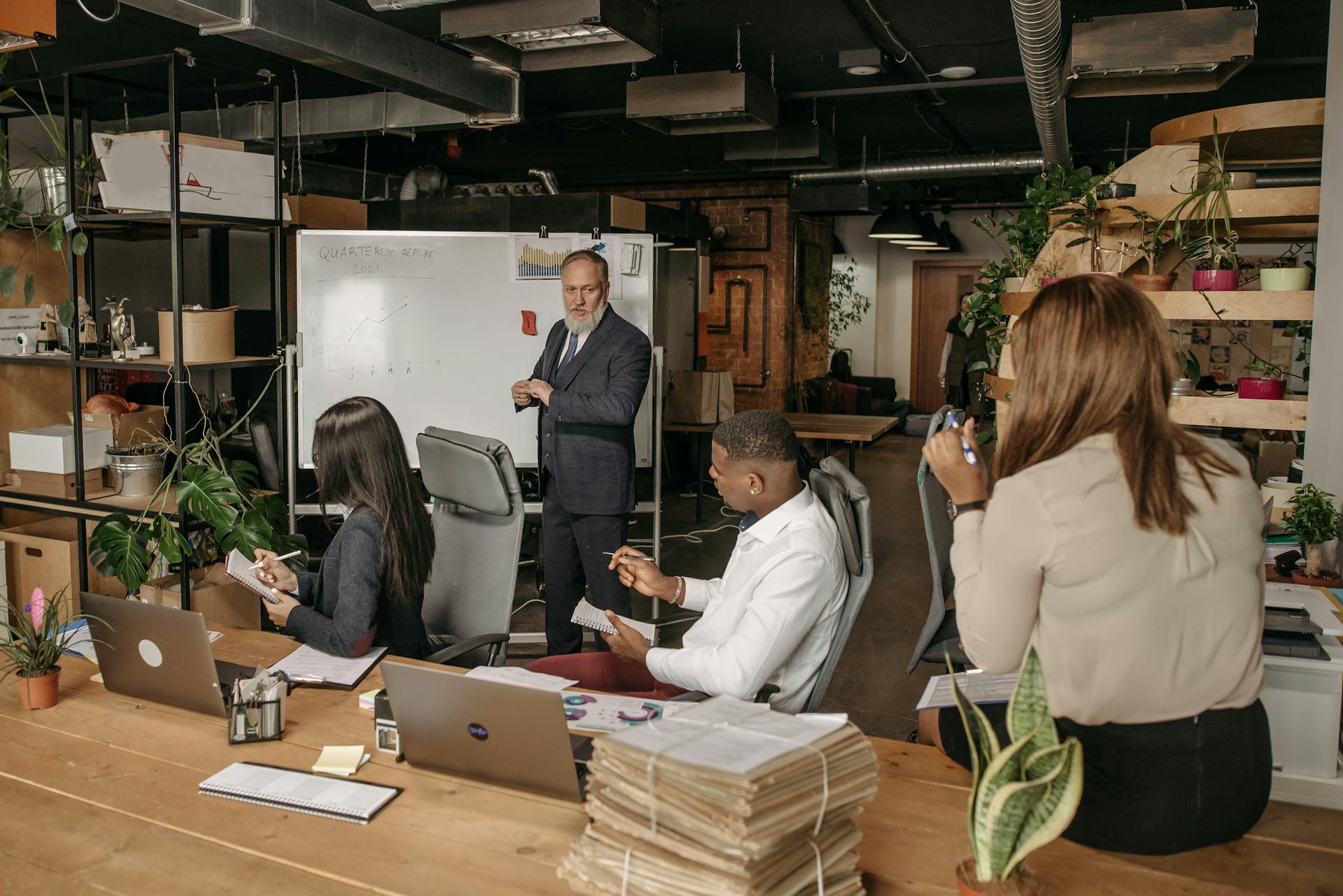 Diverse team discussing strategies in a contemporary office.