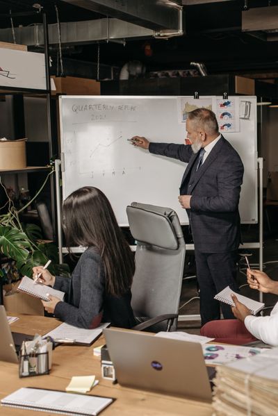 Colleagues reviewing work together — photo by Pavel Danilyuk on Pexels