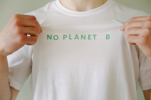 White t-shirt with 'No Planet B' slogan promoting environmental awareness.
