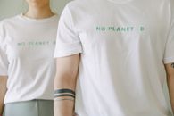 People Wearing White Themed Shirt in Close-up Photography