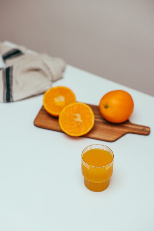 Orange Fruit on a Wooden Board