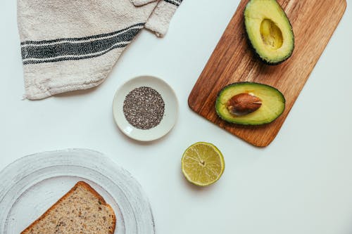 Sliced Avocado on Wooden Chopping Board