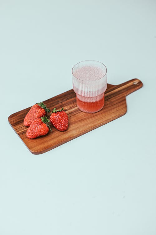 Strawberries on Brown Chopping Board
