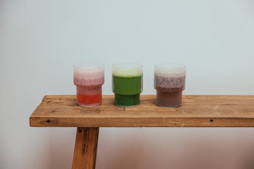Various Drinks on a Wooden Bench