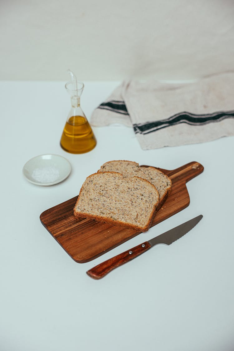 Wheat Bread On Wooden Chopping Board