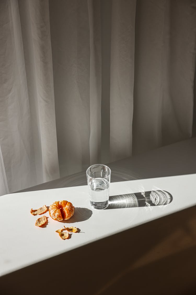 Clear Drinking Glass On White Table