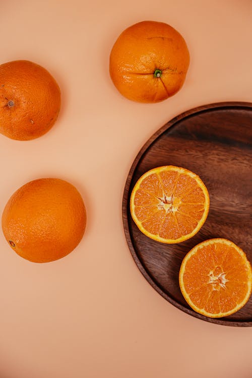Безкоштовне стокове фото на тему «апельсини, вертикальні постріл, вид зверху»