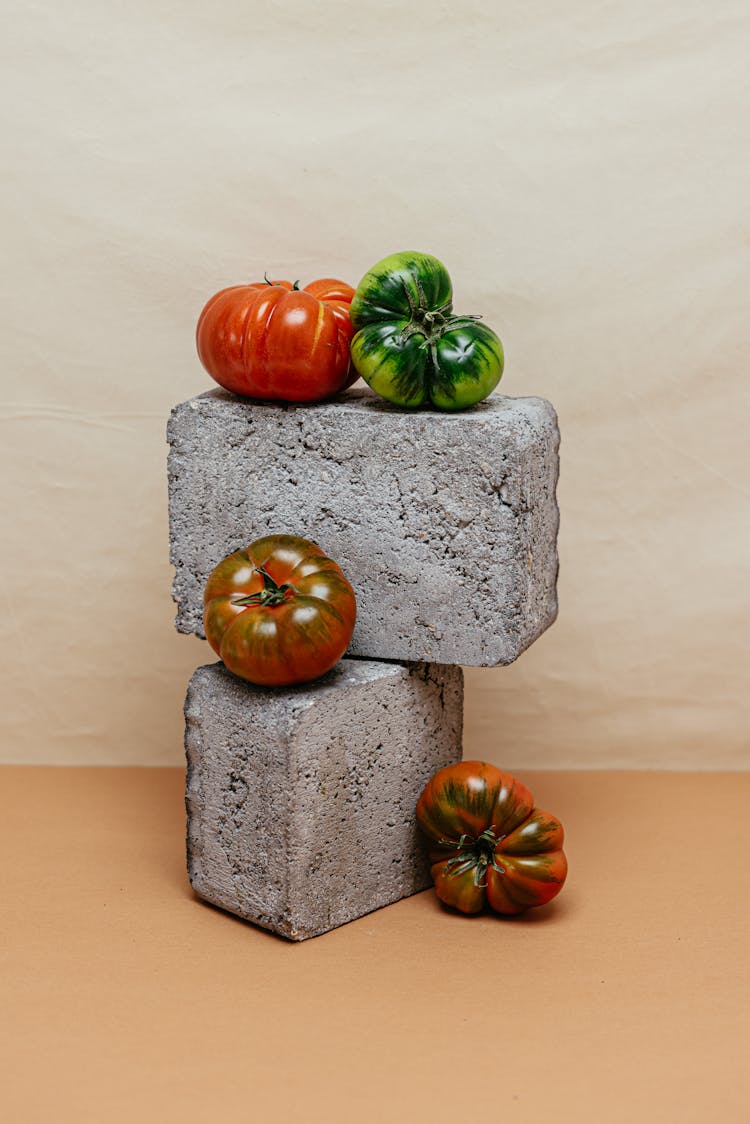 Tomatoes On Gray Concrete Blocks