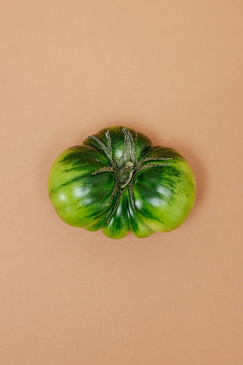 Green Tomato in Close Up Photography