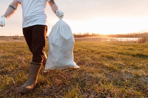 Free A Man  Holding a Sack of Garbage Stock Photo