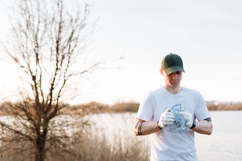 Photos gratuites de bouteille en plastique, casquette, détritus