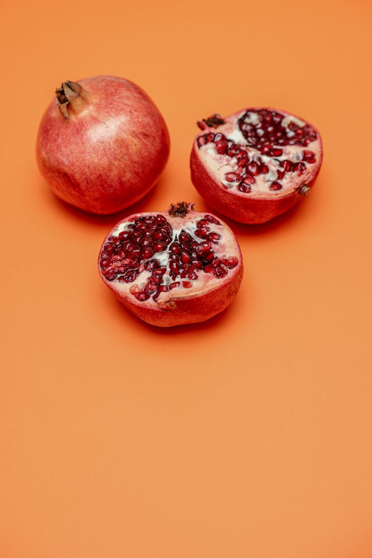 A Pomegranate Fruit Cut In Half