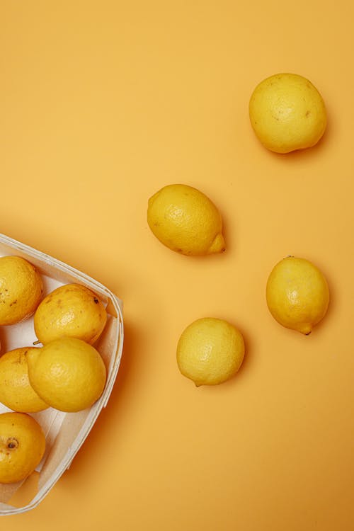 Yellow Lemons on Yellow Surface