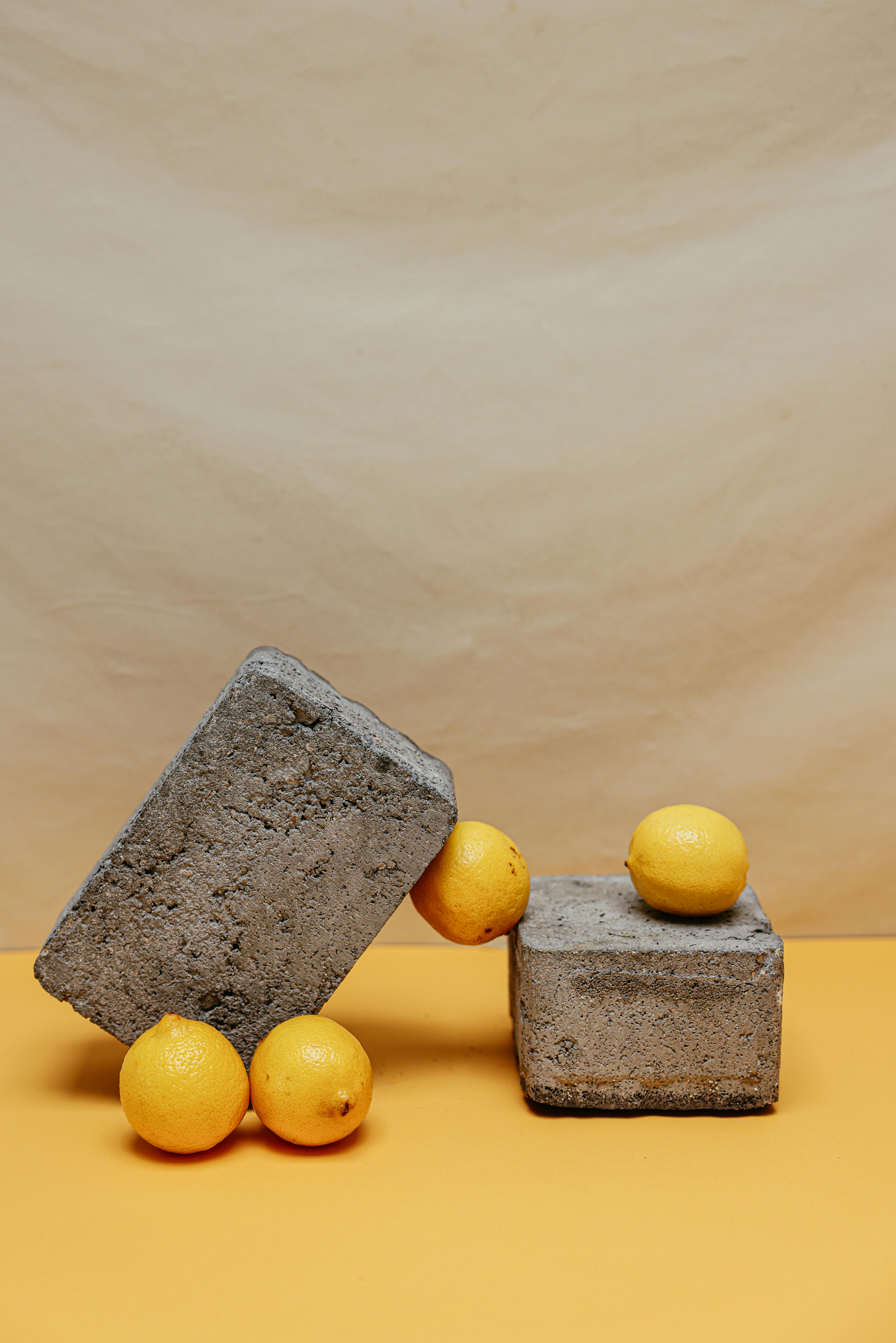 Lemons on Concrete Blocks · Free Stock Photo