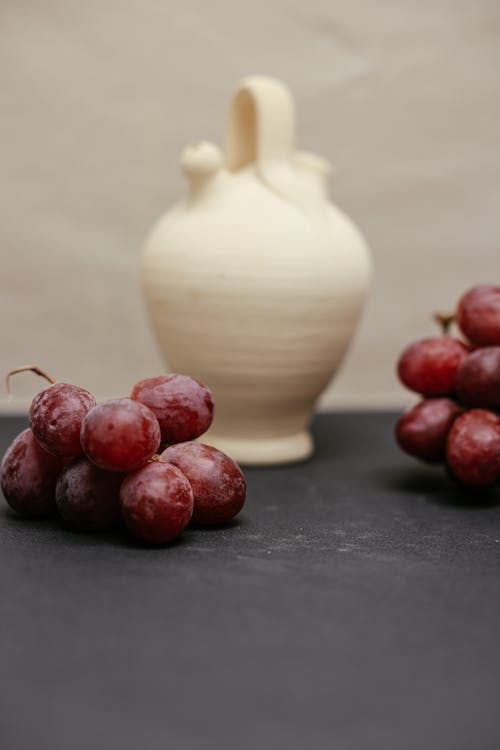 Grapes on a Black Surface