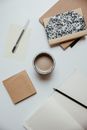 A Cup of Coffee beside the Notebooks