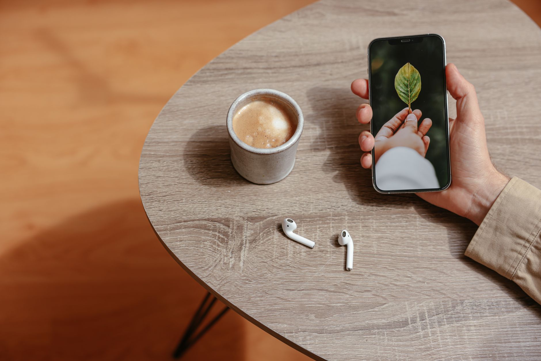 ADHD paralysis how to start adhd & emotions adhd — person setting timer on phone at cozy desk focused morning light