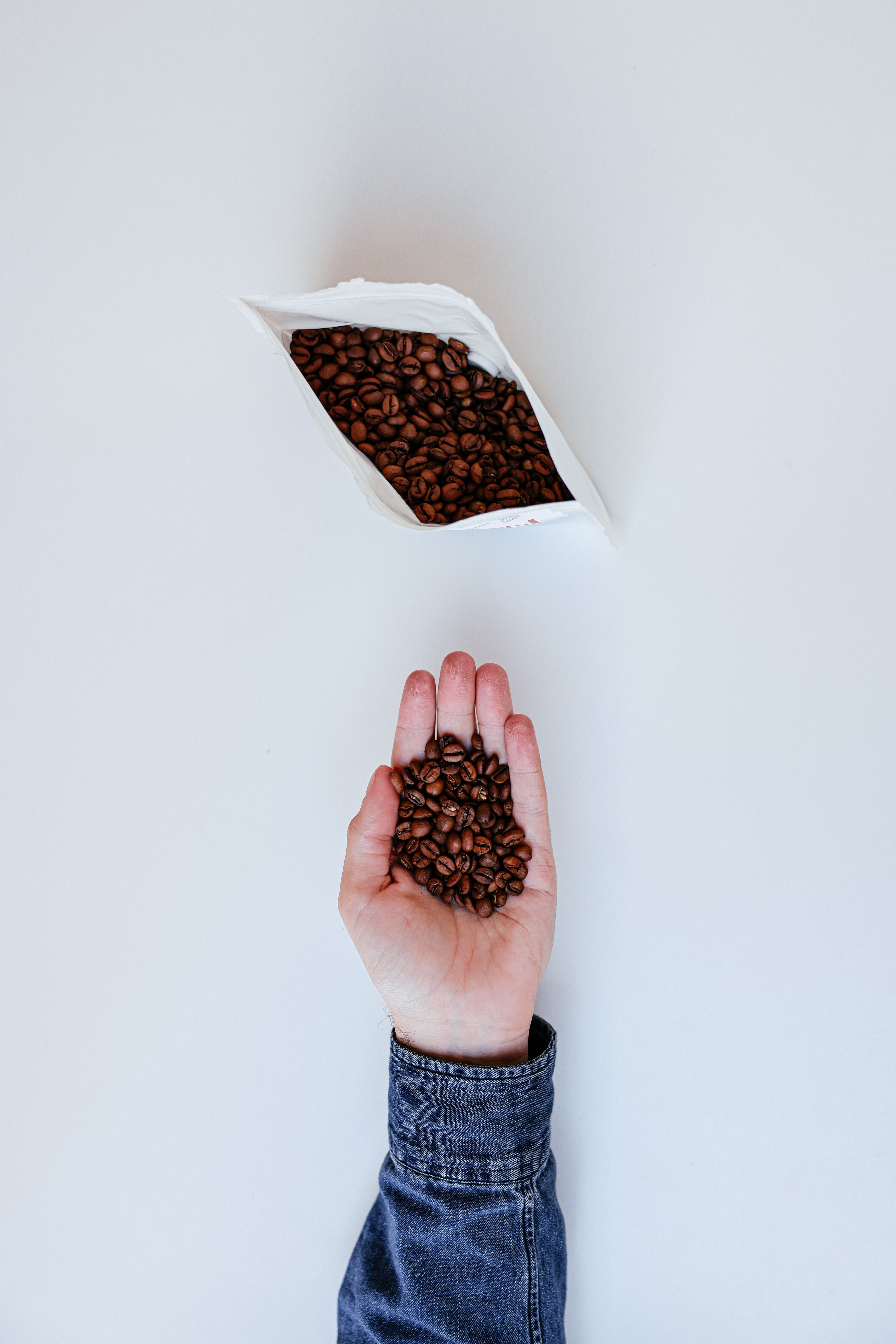 A Bag And a Handful of Coffee Beans