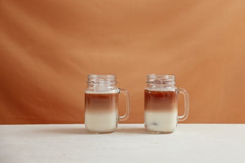 Free Refreshing Iced Coffee in Glass Jars Stock Photo