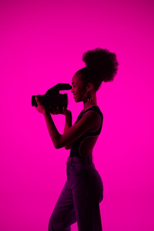 Gratis stockfoto met afro haar, Afro-Amerikaanse vrouw, apparaatje Stockfoto