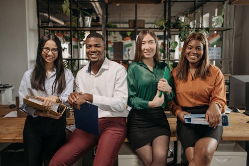 People Sitting on Table in the Office