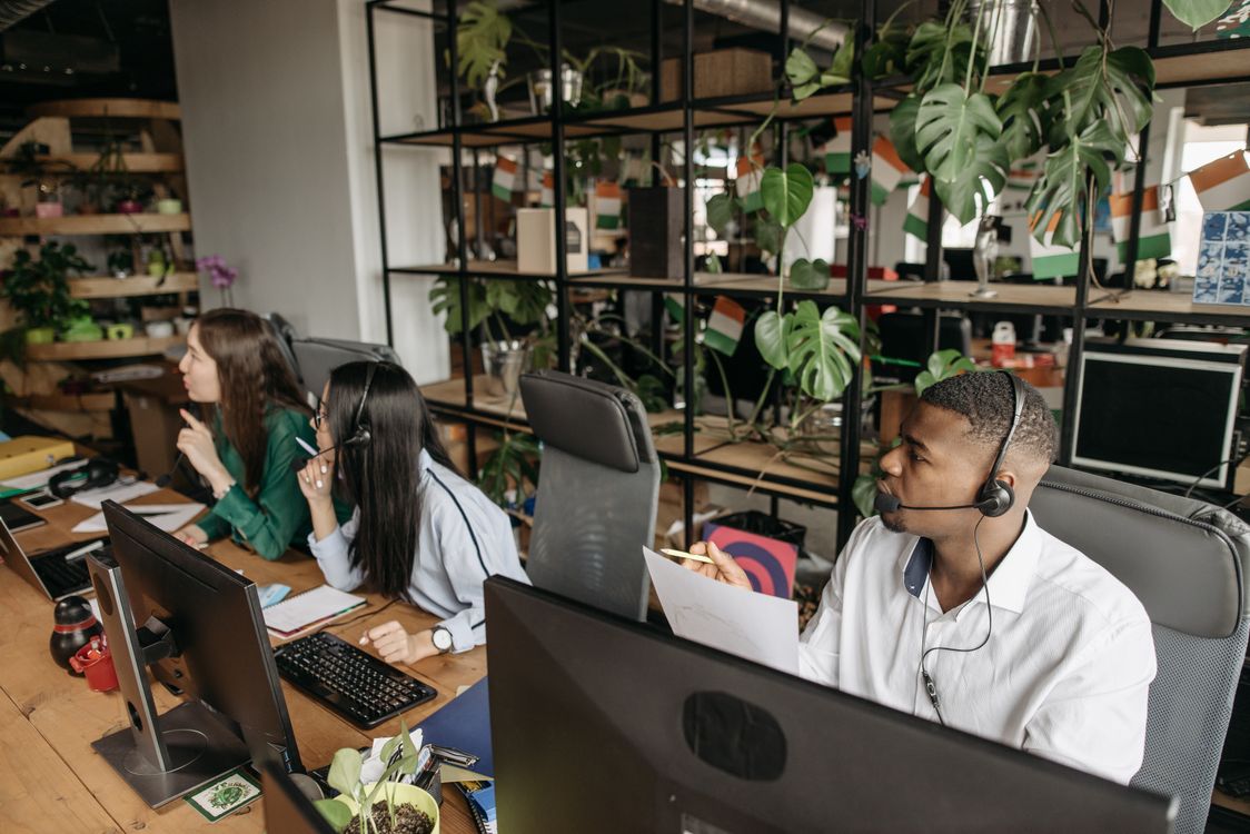 diverse team collaborating in modern office
