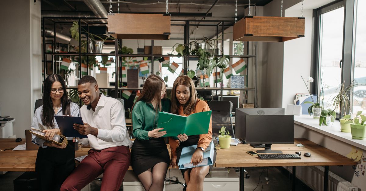 diverse professionals collaborating in a modern coworking space