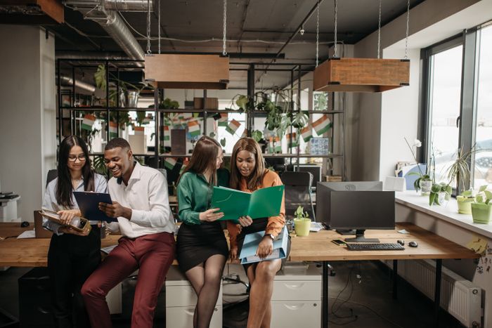 A team working in a warm open-plan studio, photo by Pavel Danilyuk on Pexels