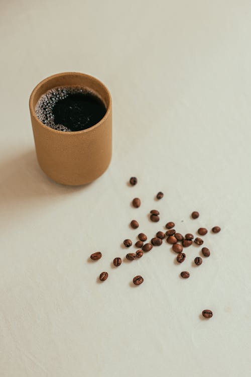 Free A Cup of Black Coffee on White Surface  Stock Photo