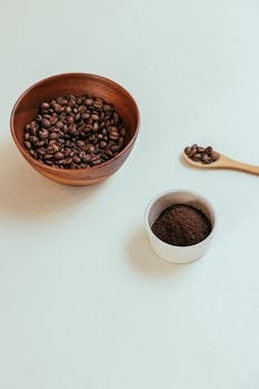 Stylish setup of coffee beans and ground coffee with a minimalist aesthetic.