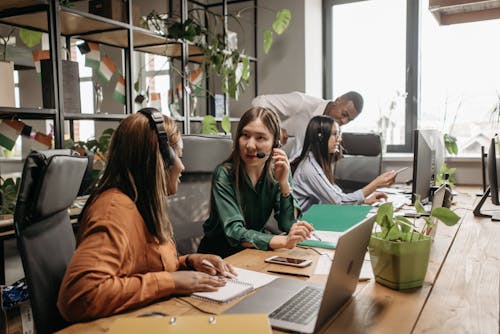 Free People Working in a Call Center Stock Photo