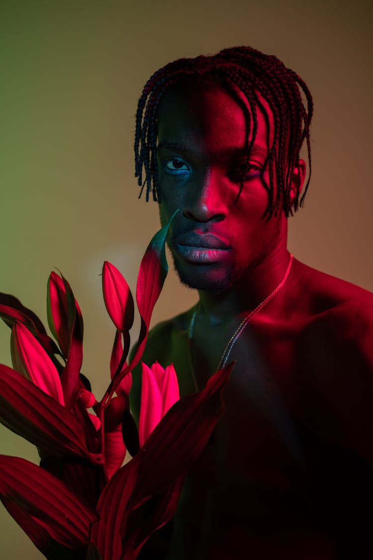 A Man Holding Flowers