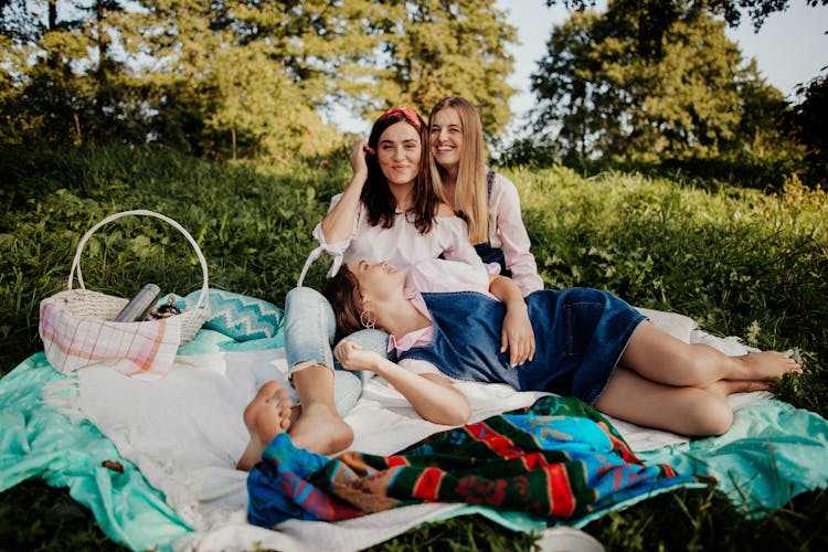 Smiling Women Together On Picnic