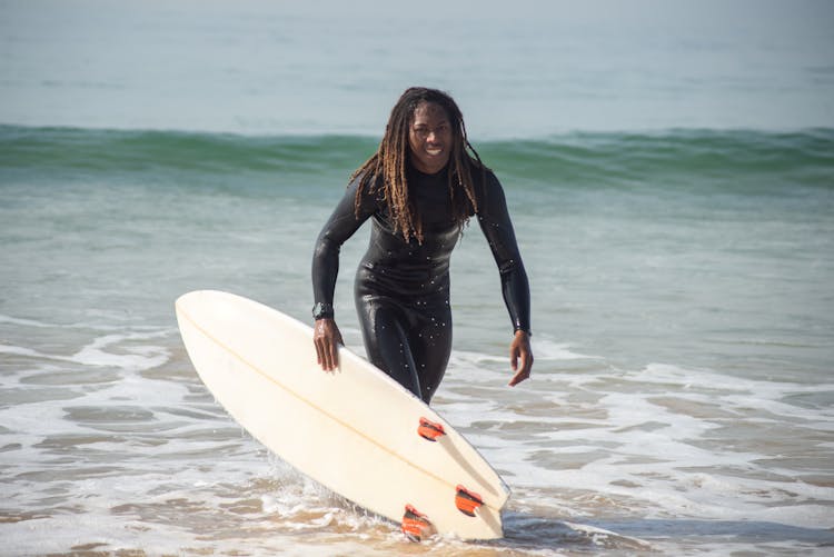 A Surfer In A Wetsuit 