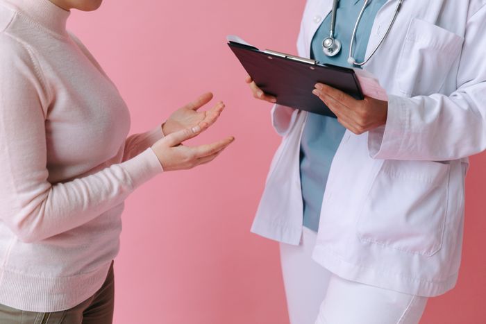 Doctor consulting with patient
