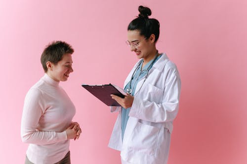 Free Doctor consulting a Patient  Stock Photo