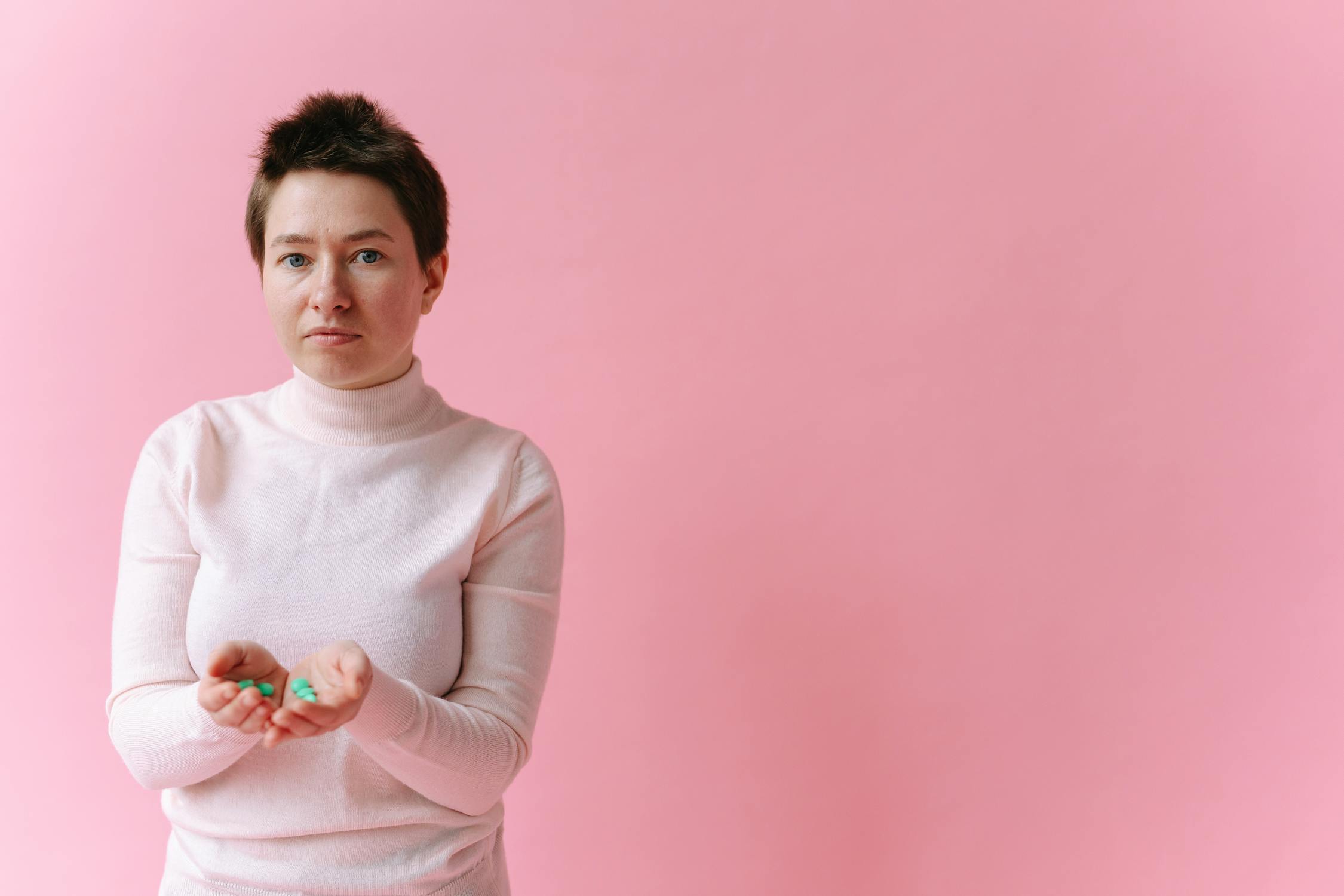 Woman holding Medicinal Pills