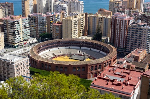 Free Aerial View of Málaga's Bullring in the Middle of the City Stock Photo