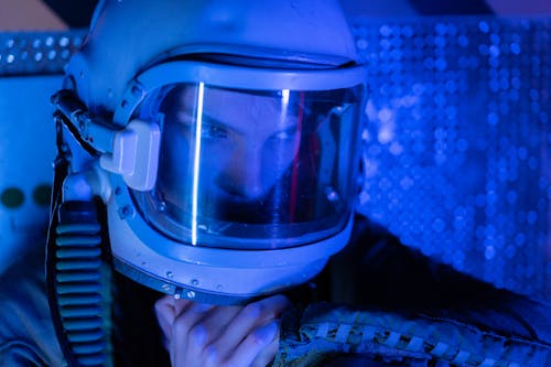 Portrait Of A Spacewoman Under Blue Light