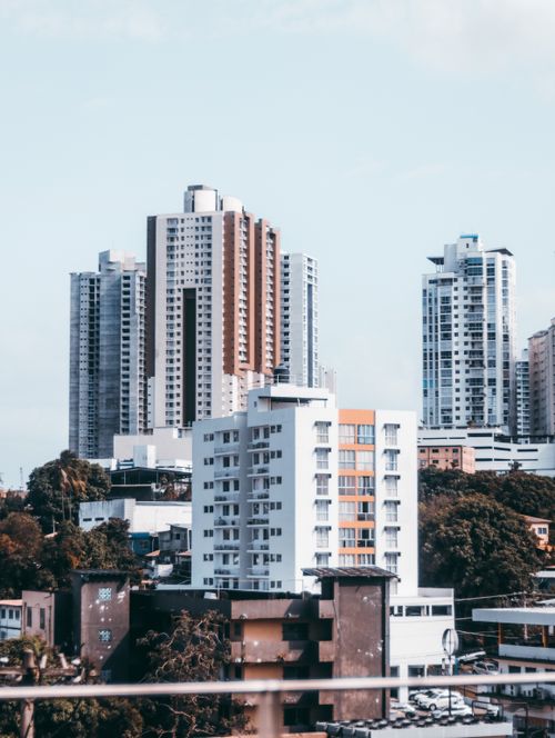 Free High-rise buildings in a bustling urban cityscape during the day. Stock Photo
