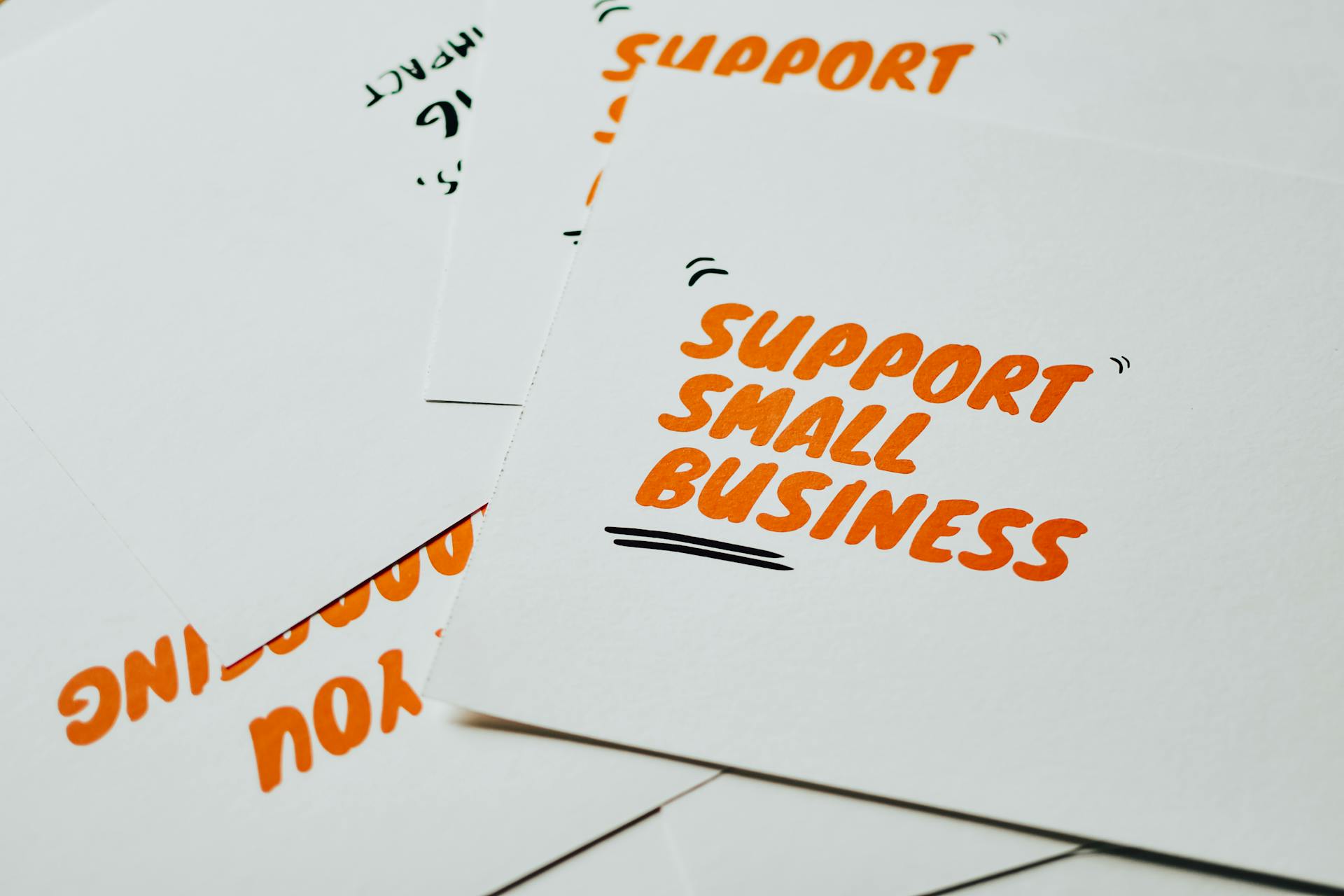 Support Small Business Text on Paper