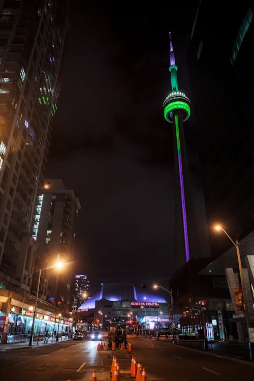 Free Green and Purple Tower during Night Time Stock Photo